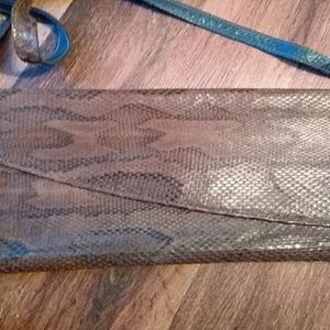 One of a kind genuine snake skin bag.